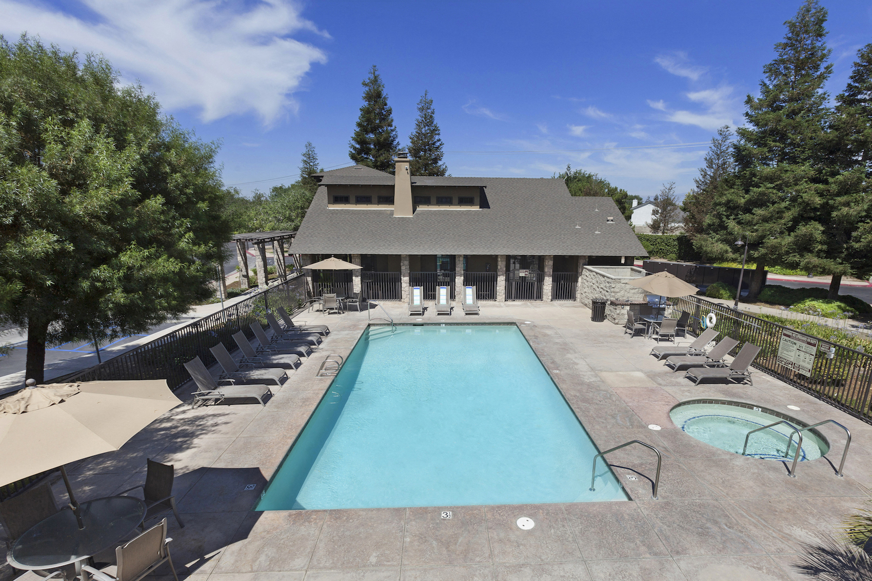 Polo Villas Pool and Heated Spa with Lounge Chairs, Tables, Umbrellas and BBQ  at Polo Villas, California